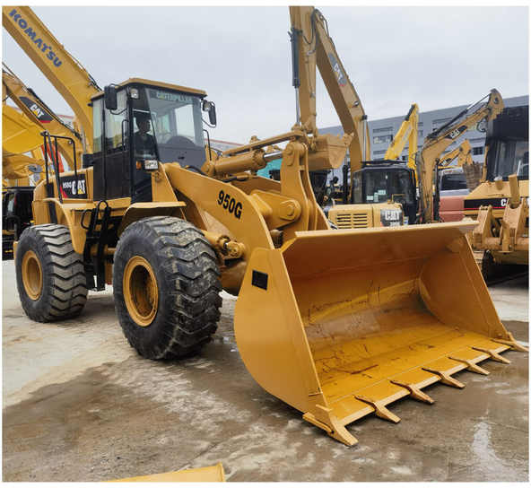 Cheap price pay loader Used CAT 950GC second hand CAT 950GC wheel front loader - Gumikerekes homlokrakodó: 1 kép. Cheap price pay loader Used CAT 950GC second hand CAT 950GC wheel front loader - Gumikerekes homlokrakodó: 1 kép.