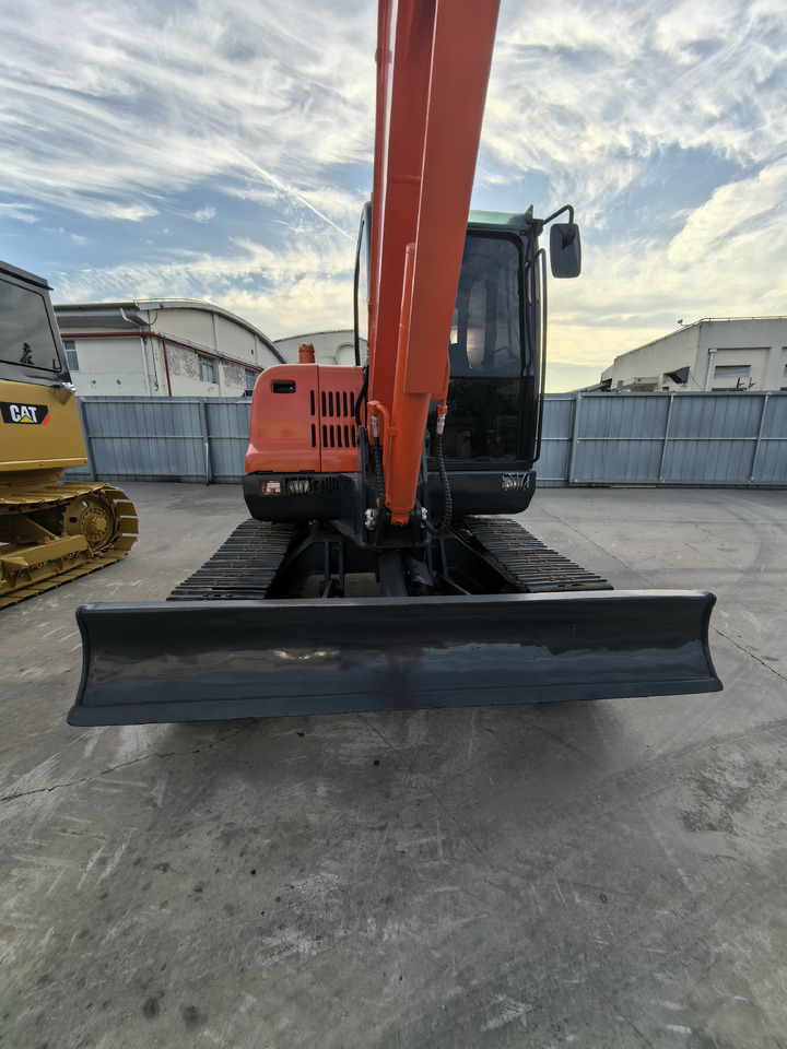 Doosan Dx60 Crawler Excavator - Lánctalpas kotró: 5 kép. Doosan Dx60 Crawler Excavator - Lánctalpas kotró: 5 kép.