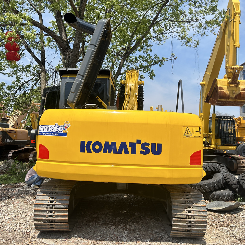 Komatsu PC130-7 Excavator - Lánctalpas kotró: 5 kép. Komatsu PC130-7 Excavator - Lánctalpas kotró: 5 kép.