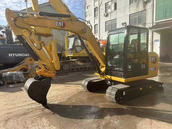 Lowest price used cat 306E2 small crawler digger caterpillar 306e2 mini excavator for sale - Lánctalpas kotró: 3 kép. Lowest price used cat 306E2 small crawler digger caterpillar 306e2 mini excavator for sale - Lánctalpas kotró: 3 kép.