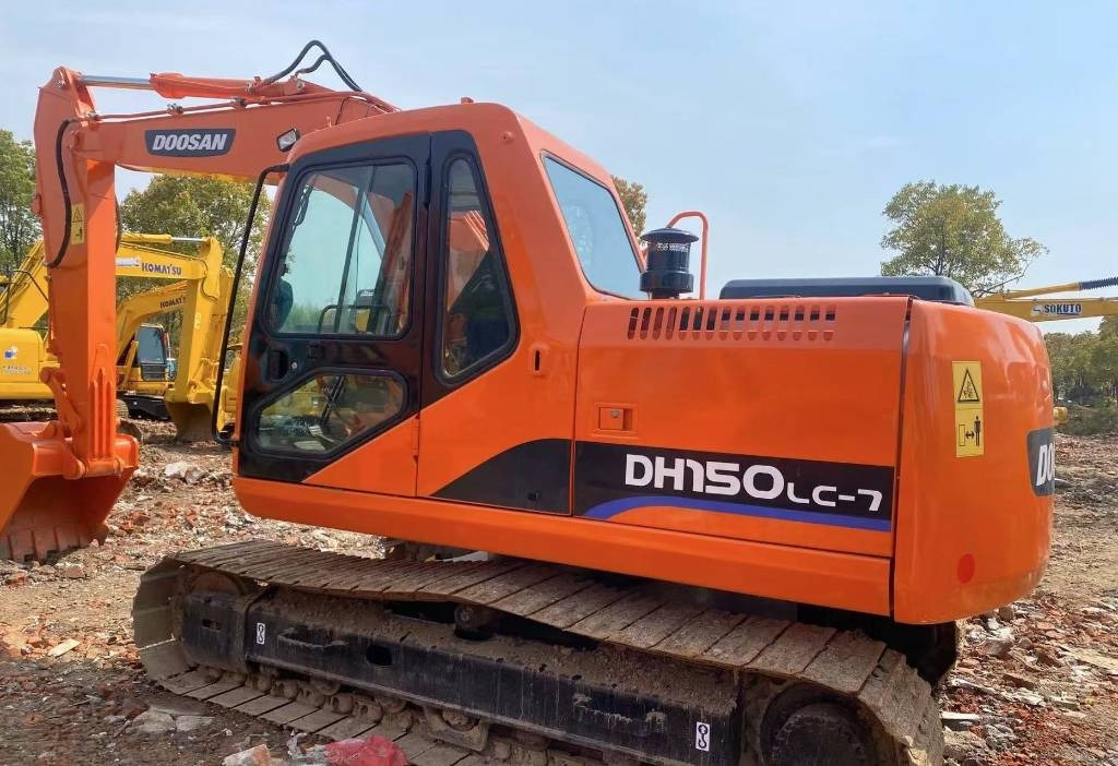 Doosan DH 150 - Lánctalpas kotró: 1 kép. Doosan DH 150 - Lánctalpas kotró: 1 kép.