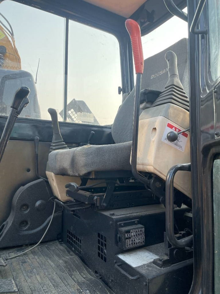 Doosan DH 55 - Minikotró: 3 kép. Doosan DH 55 - Minikotró: 3 kép.