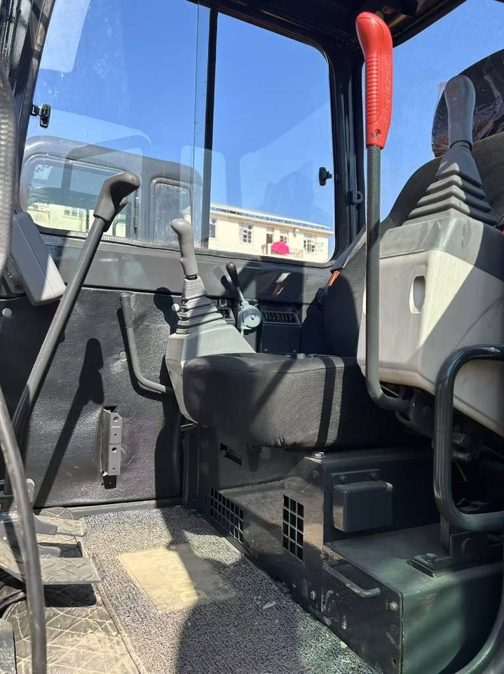 Doosan DH 55 - Minikotró: 4 kép. Doosan DH 55 - Minikotró: 4 kép.