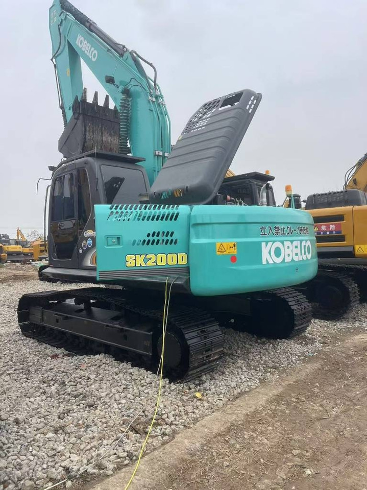 Kobelco SK 200 - Lánctalpas kotró: 1 kép. Kobelco SK 200 - Lánctalpas kotró: 1 kép.