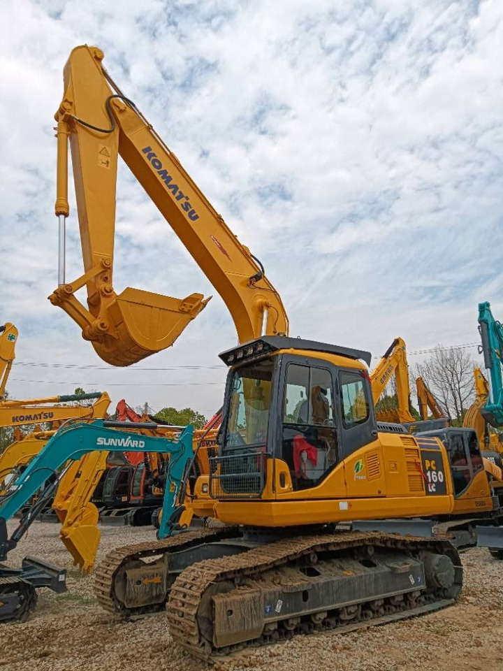 Komatsu PC 160 - Lánctalpas kotró: 1 kép. Komatsu PC 160 - Lánctalpas kotró: 1 kép.