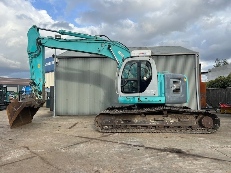 Kobelco SK 235 SR LC - Lánctalpas kotró: 1 kép. Kobelco SK 235 SR LC - Lánctalpas kotró: 1 kép.