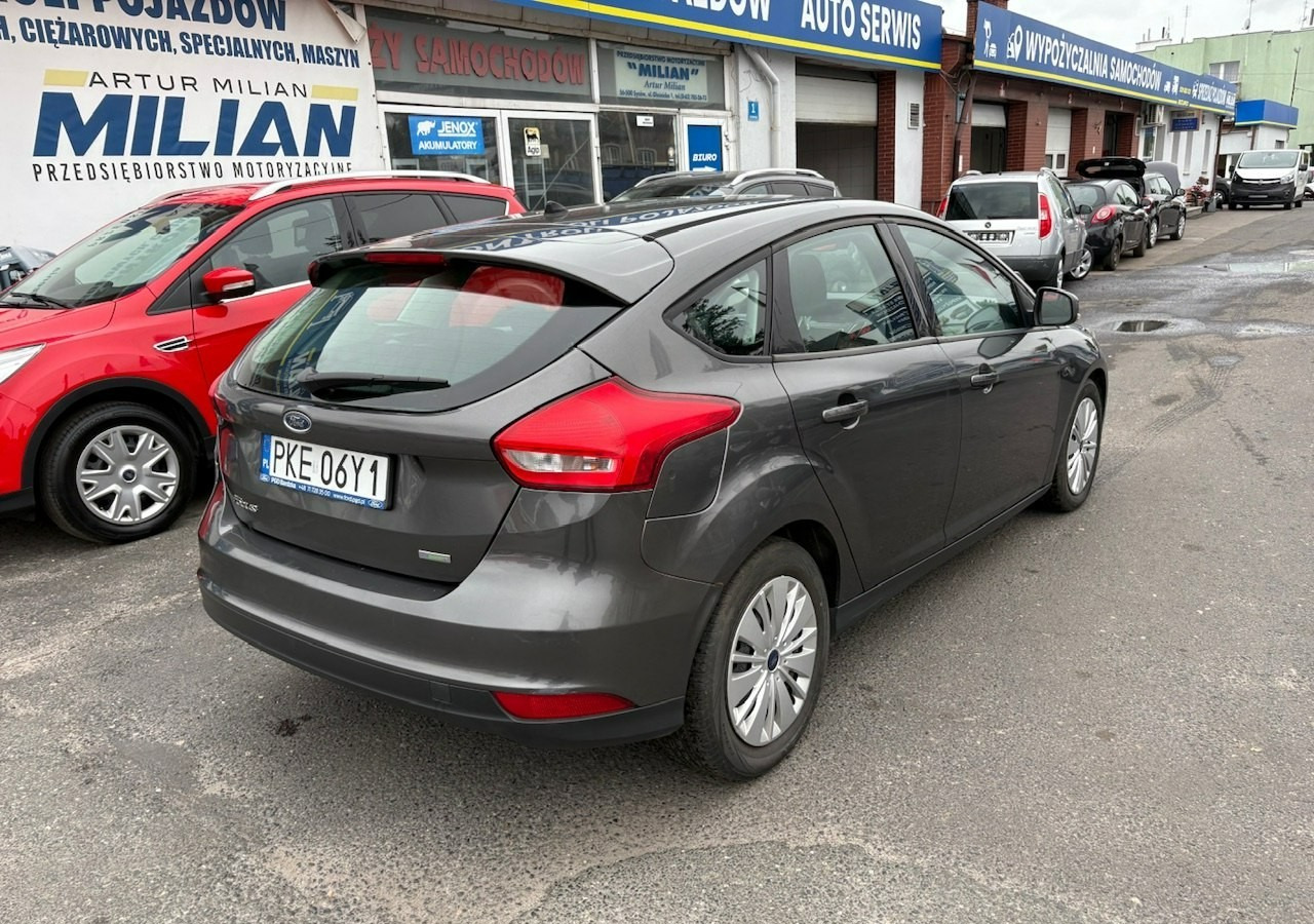 Ford Focus III Focus 1.0 EcoBoost Klima Salon PL 2015 - Hatchback: 4 kép. Ford Focus III Focus 1.0 EcoBoost Klima Salon PL 2015 - Hatchback: 4 kép.