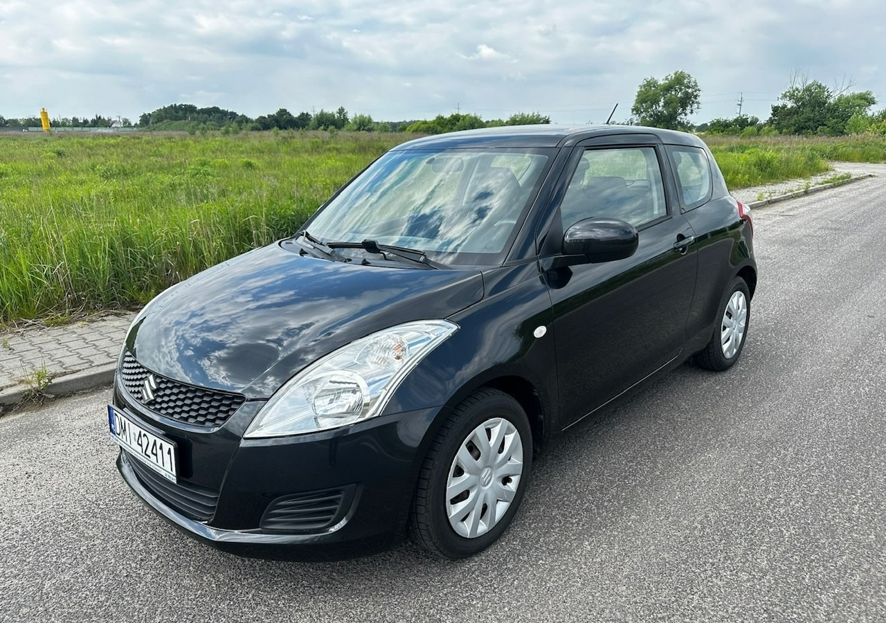 Suzuki Swift V Suzuki Swift 1.2-94KM Klima Model 2012 - Hatchback: 1 kép. Suzuki Swift V Suzuki Swift 1.2-94KM Klima Model 2012 - Hatchback: 1 kép.