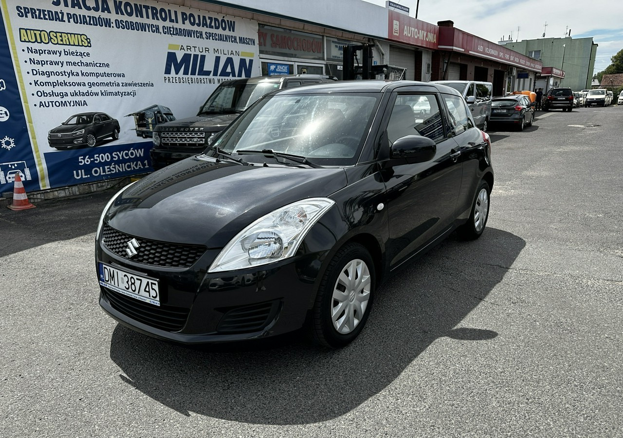 Suzuki Swift V Suzuki Swift 1.2-94KM Klima Model 2012 - Hatchback: 2 kép. Suzuki Swift V Suzuki Swift 1.2-94KM Klima Model 2012 - Hatchback: 2 kép.