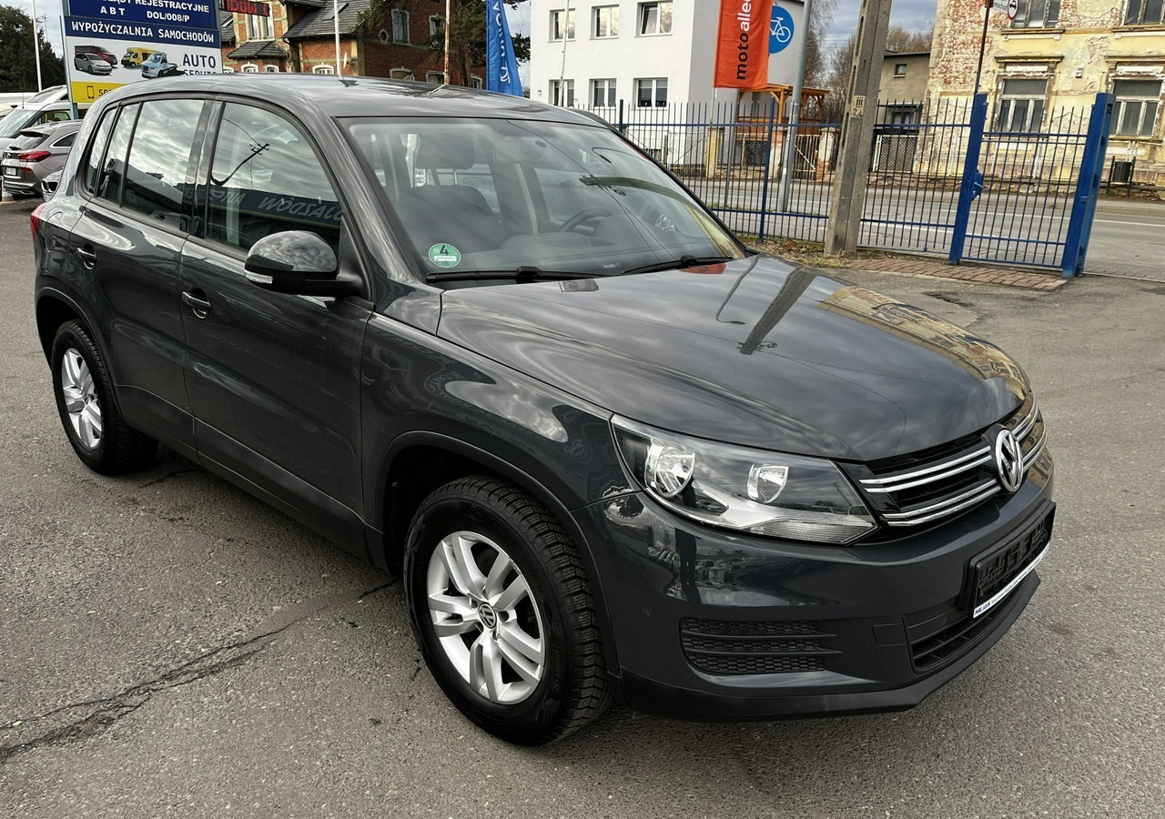 Volkswagen Tiguan II 1.4TSI DSG 150KM LIFT 2016 Automat Navi Klima Alu - Autó: 4 kép. Volkswagen Tiguan II 1.4TSI DSG 150KM LIFT 2016 Automat Navi Klima Alu - Autó: 4 kép.