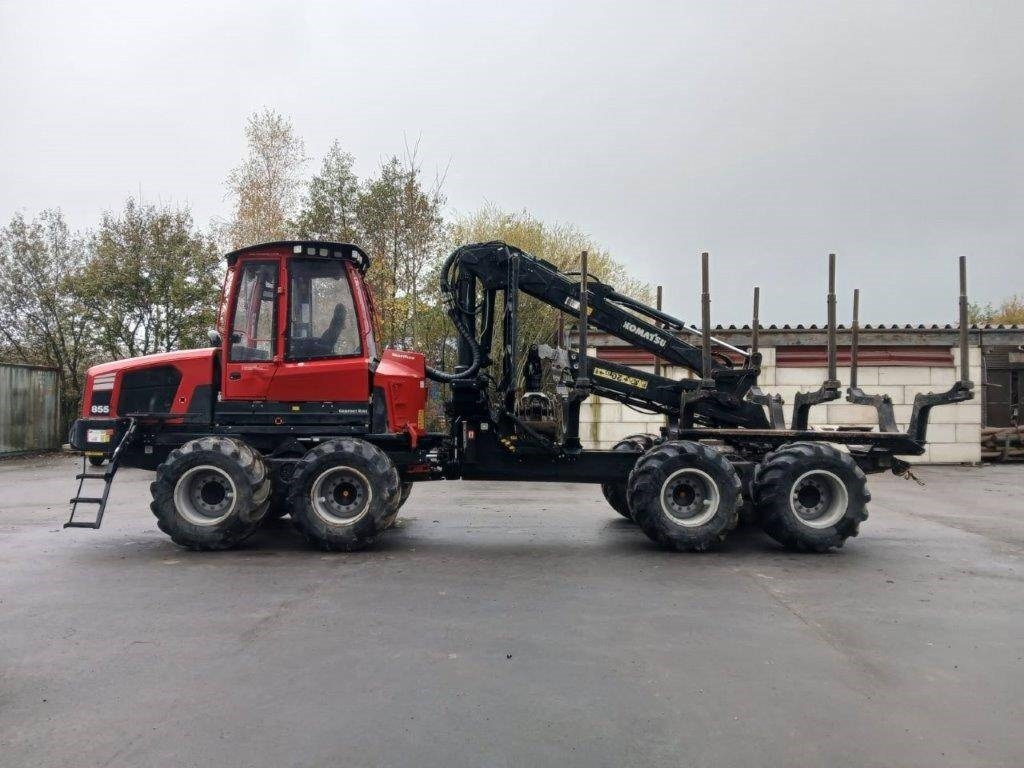 Komatsu 855  - Kihordó: 2 kép. Komatsu 855  - Kihordó: 2 kép.