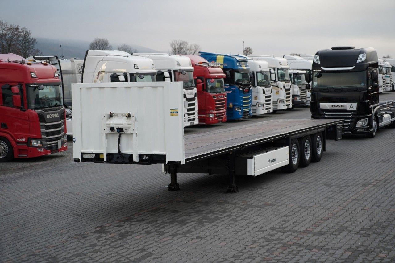 Krone NACZEPA PLATFORMA / OŚ PODNOSZONA / KOSZ NA PAL - Platós félpótkocsi: 1 kép. Krone NACZEPA PLATFORMA / OŚ PODNOSZONA / KOSZ NA PAL - Platós félpótkocsi: 1 kép.