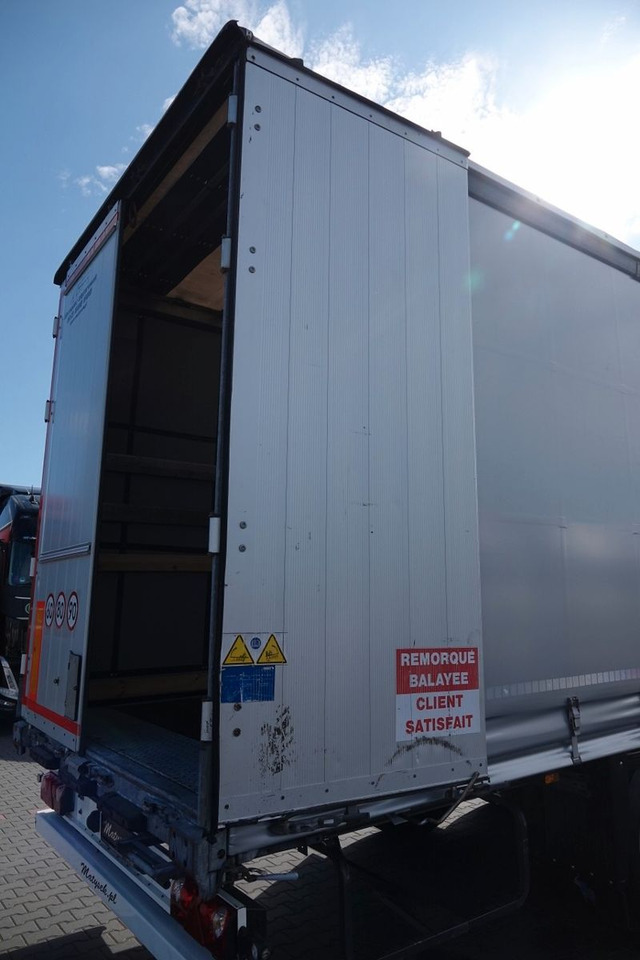 Ponyvás félpótkocsi Schmitz Cargobull FIRANKA / STANDARD / 2 OSIE PODNOSZONE / SPROWA: 10 kép.