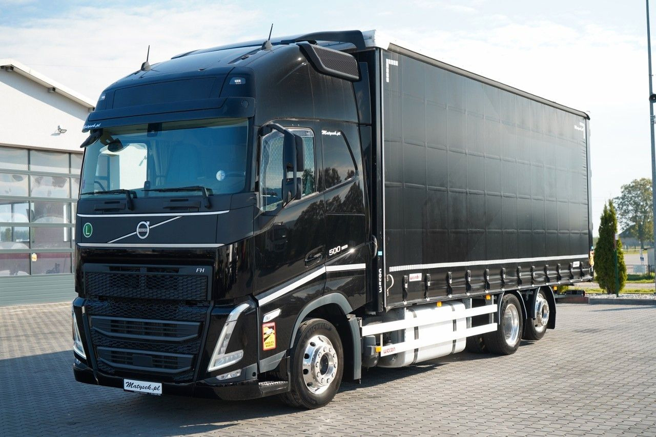 Volvo FH 500 / MEGA / ZESTAW TANDEM PRZEJAZDOWY 120 M3 - Ponyvás teherautó: 2 kép. Volvo FH 500 / MEGA / ZESTAW TANDEM PRZEJAZDOWY 120 M3 - Ponyvás teherautó: 2 kép.