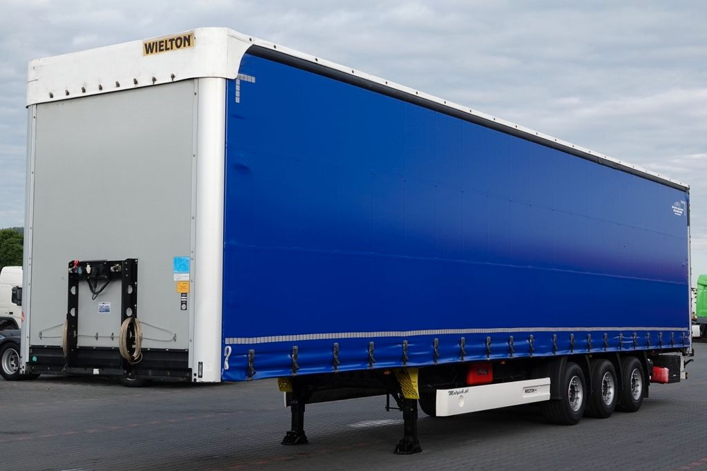 Wielton CURTAINSIDER / STANDARD /LIFTED AXLE & ROOF/BDE - Ponyvás félpótkocsi: 1 kép. Wielton CURTAINSIDER / STANDARD /LIFTED AXLE & ROOF/BDE - Ponyvás félpótkocsi: 1 kép.