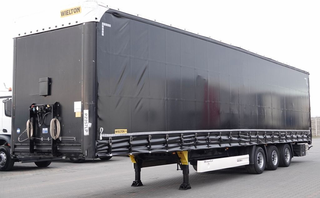 Wielton FIRANKA / MEGA / LOWDECK / OŚ PODNOSZONA / 2016 Wielton FIRANKA / MEGA / LOWDECK / OŚ PODNOSZONA / 2016 - Ponyvás félpótkocsi: 2 kép. Wielton FIRANKA / MEGA / LOWDECK / OŚ PODNOSZONA / 2016 Wielton FIRANKA / MEGA / LOWDECK / OŚ PODNOSZONA / 2016 - Ponyvás félpótkocsi: 2 kép.