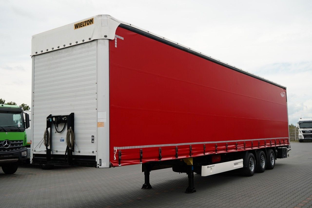 Wielton FIRANKA MEGA / LOWDECK / OŚ PODNOSZONA / OSIE SA - Ponyvás félpótkocsi: 3 kép. Wielton FIRANKA MEGA / LOWDECK / OŚ PODNOSZONA / OSIE SA - Ponyvás félpótkocsi: 3 kép.