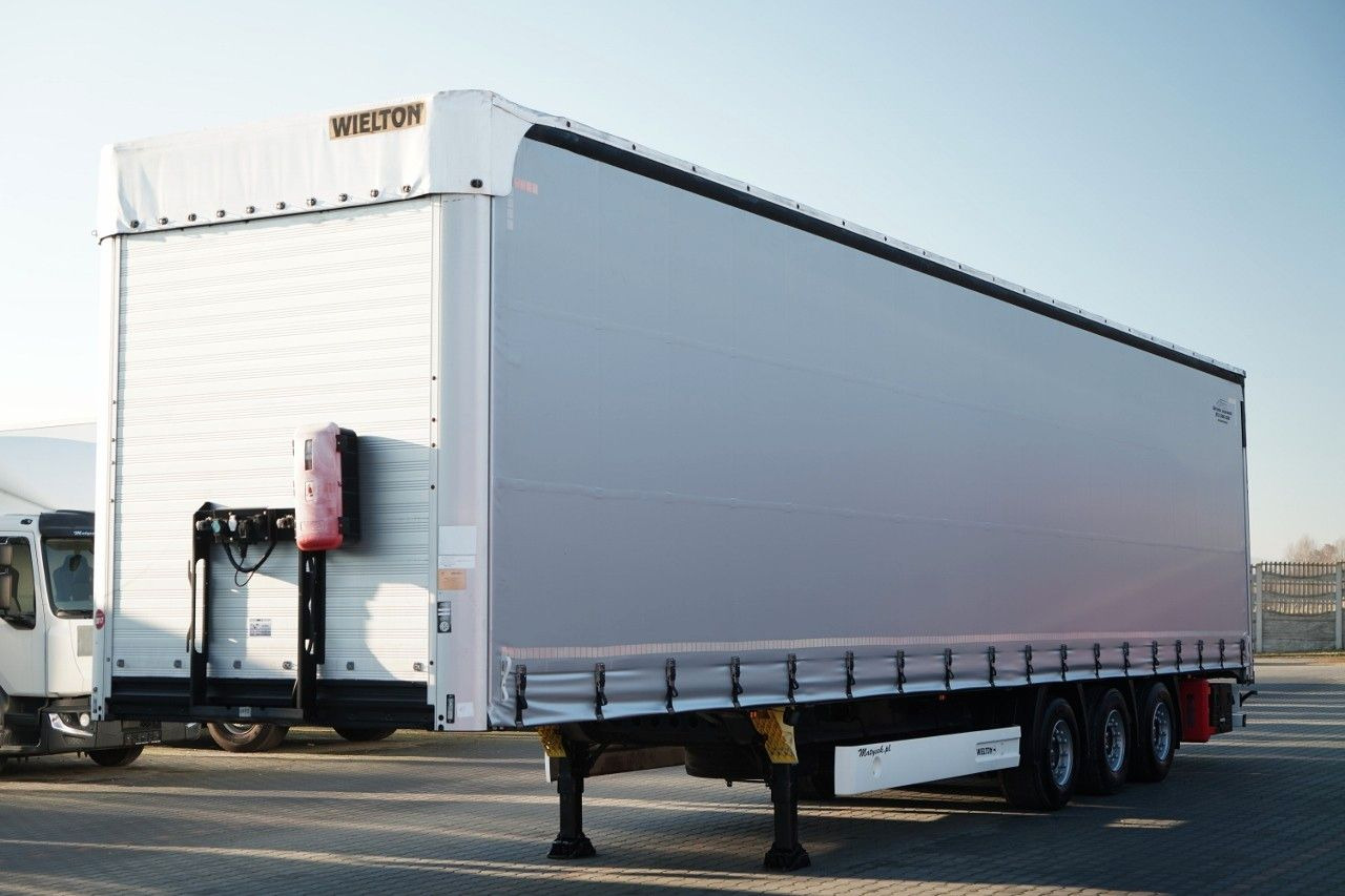 Wielton FIRANKA / MEGA / OŚ PODNOSZONA / OSIE SAF / - Ponyvás félpótkocsi: 1 kép. Wielton FIRANKA / MEGA / OŚ PODNOSZONA / OSIE SAF / - Ponyvás félpótkocsi: 1 kép.