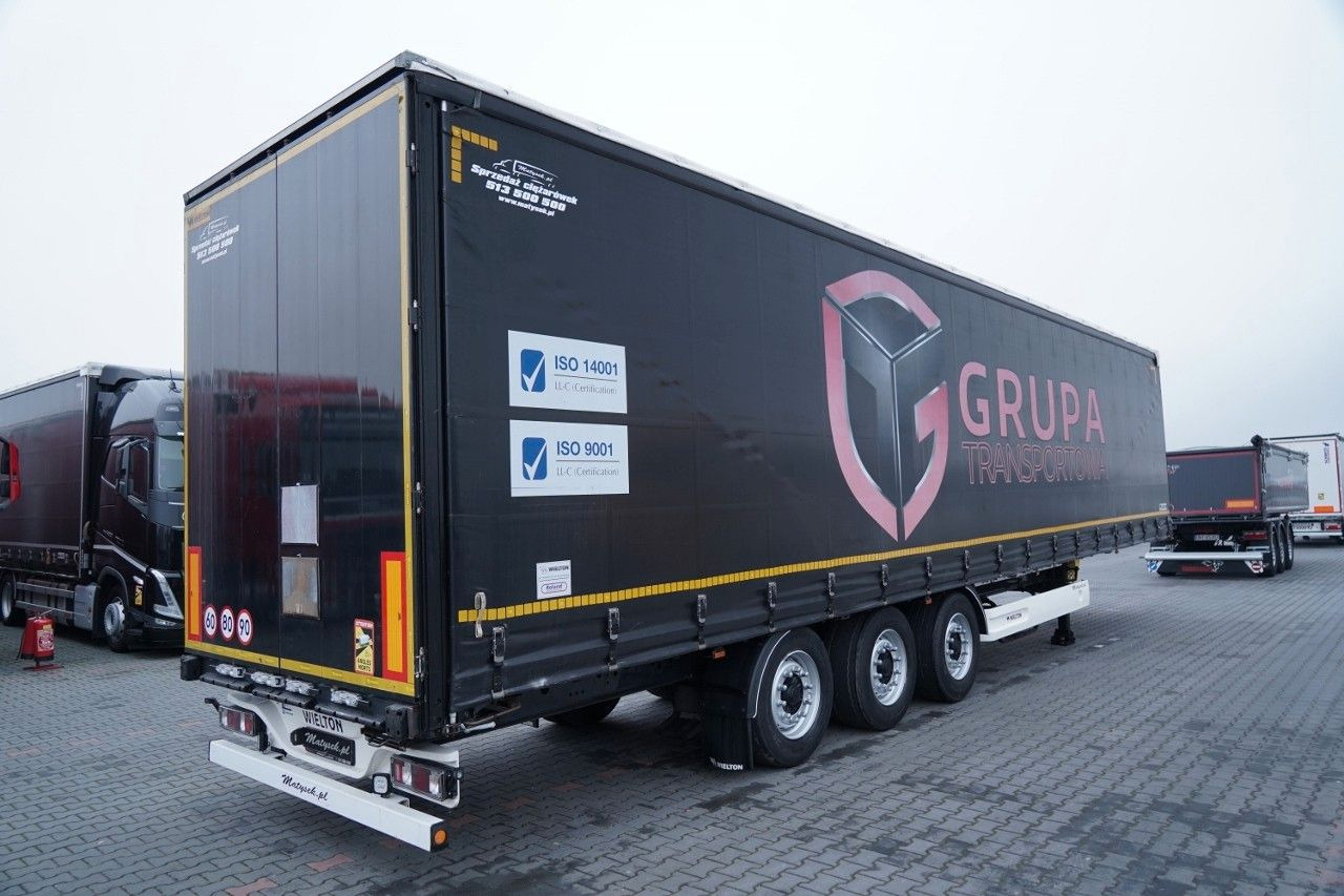 Wielton FIRANKA / VARIOS / 2x OŚ PODNOSZONA / - Ponyvás félpótkocsi: 5 kép. Wielton FIRANKA / VARIOS / 2x OŚ PODNOSZONA / - Ponyvás félpótkocsi: 5 kép.