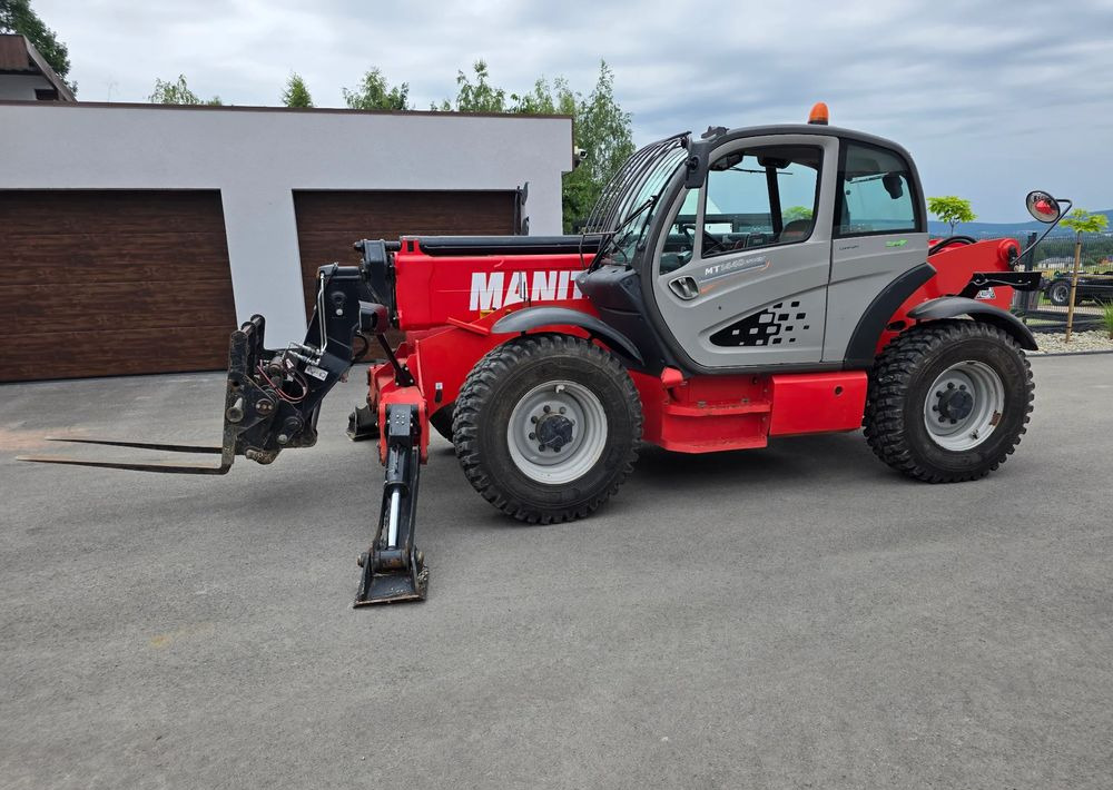 Manitou MT 1440 EASY - Teleszkópos rakodó: 1 kép. Manitou MT 1440 EASY - Teleszkópos rakodó: 1 kép.
