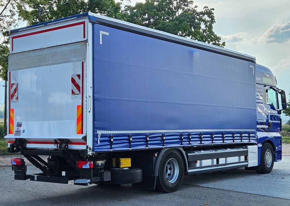 MAN TGX 18.430 / FIRANKA / WINDA / KLIMA POSTOJOWA / 300TYŚ PRZEBIEG / 2020 /E6 / KLIMA POSTOJOWA / SPROWADZONY / JAK NOWY / AUTOMAT - Ponyvás teherautó: 4 kép. MAN TGX 18.430 / FIRANKA / WINDA / KLIMA POSTOJOWA / 300TYŚ PRZEBIEG / 2020 /E6 / KLIMA POSTOJOWA / SPROWADZONY / JAK NOWY / AUTOMAT - Ponyvás teherautó: 4 kép.