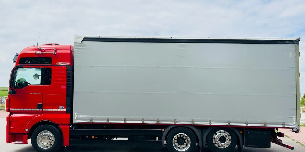 Ponyvás teherautó MAN TGX 26.500 / LIFT / 6X2 / KLIMA POSTOJOWA / 18PALET / E6 / FIRANKA / 18 TON ŁADOWNOŚĆ / WINDA / NISKI PRZEBIEG / JEDEN WŁAŚCICIEL / PODWIESZANA OŚ: 17 kép.