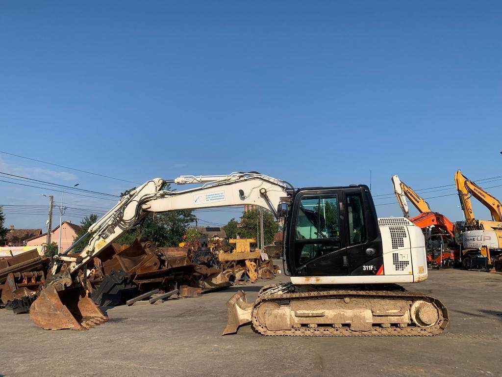 CAT 311 F LR - Lánctalpas kotró: 2 kép. CAT 311 F LR - Lánctalpas kotró: 2 kép.