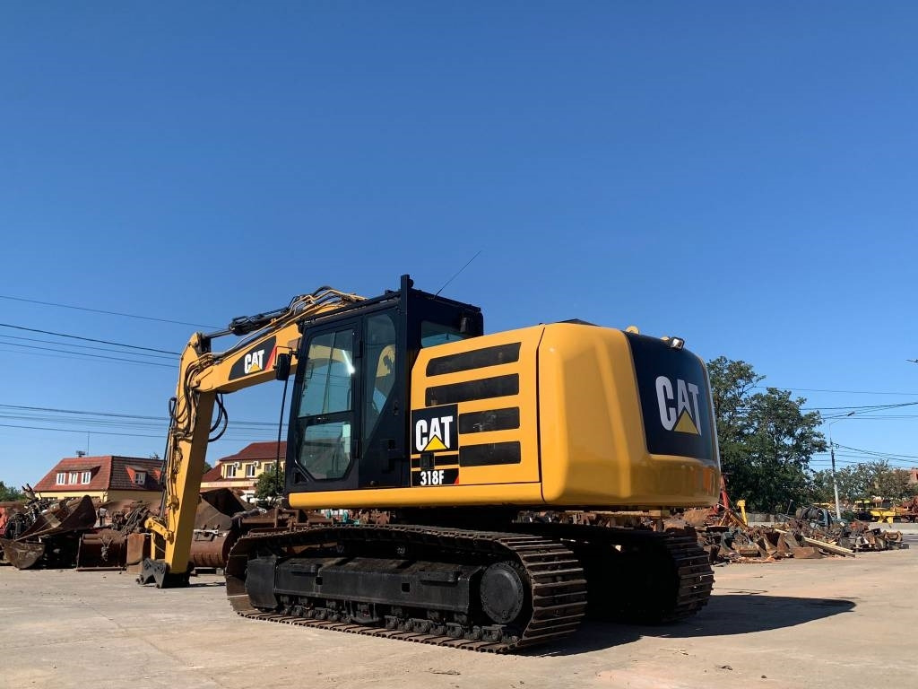 CAT 318F - Lánctalpas kotró: 3 kép. CAT 318F - Lánctalpas kotró: 3 kép.