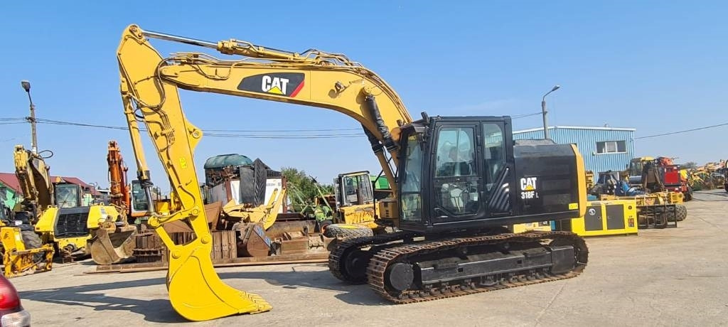 CAT 318FL - Lánctalpas kotró: 1 kép. CAT 318FL - Lánctalpas kotró: 1 kép.