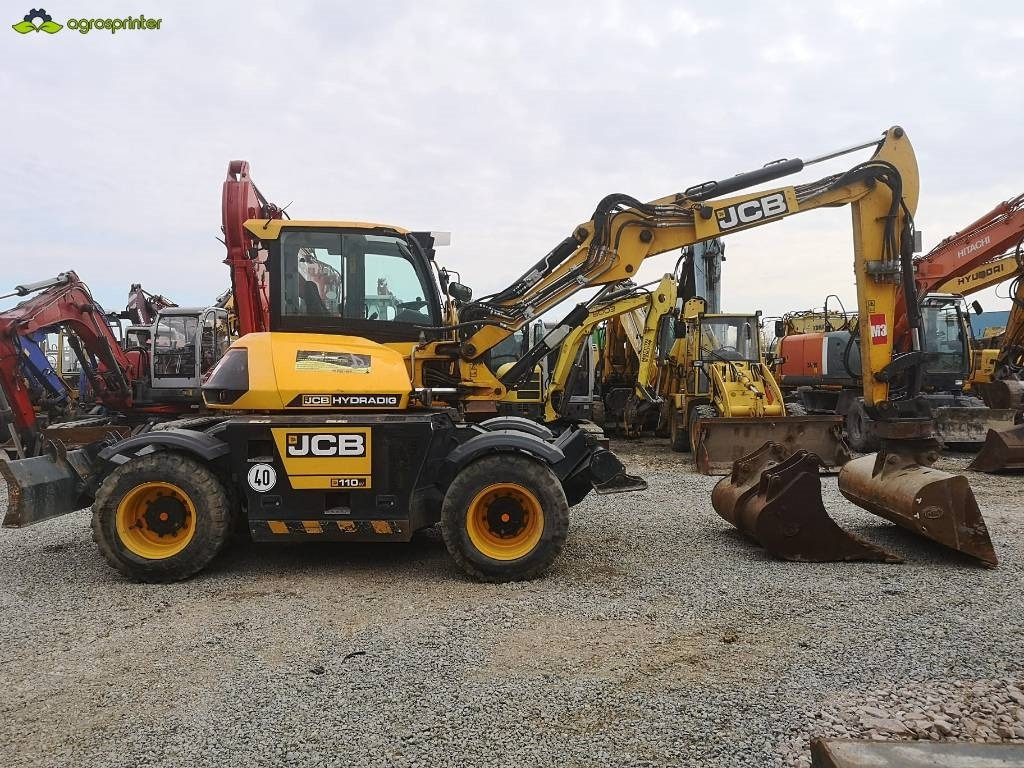 JCB Hydradig 110W - Gumikerekes kotró: 3 kép. JCB Hydradig 110W - Gumikerekes kotró: 3 kép.