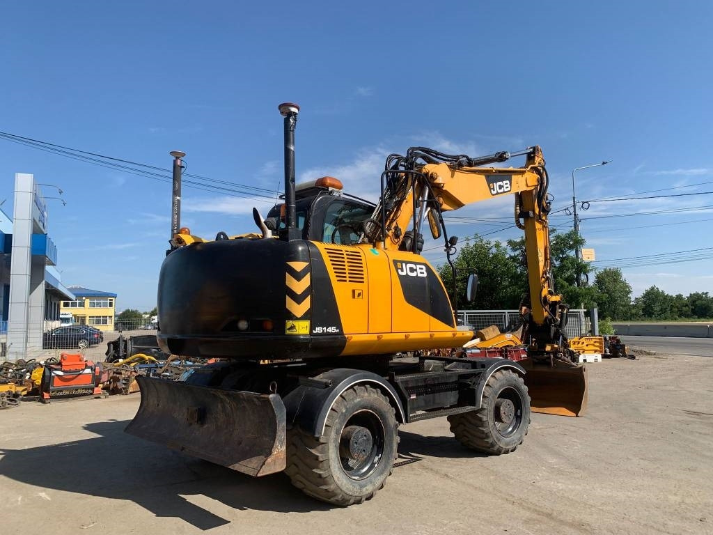 JCB JS 145 W+Engcon Rototilt+Sistem Laser 2D Leica Ico - Gumikerekes kotró: 4 kép. JCB JS 145 W+Engcon Rototilt+Sistem Laser 2D Leica Ico - Gumikerekes kotró: 4 kép.