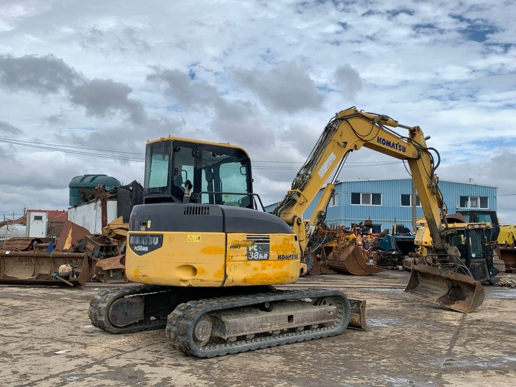 Komatsu PC 88 MR-6 - Minikotró: 4 kép. Komatsu PC 88 MR-6 - Minikotró: 4 kép.