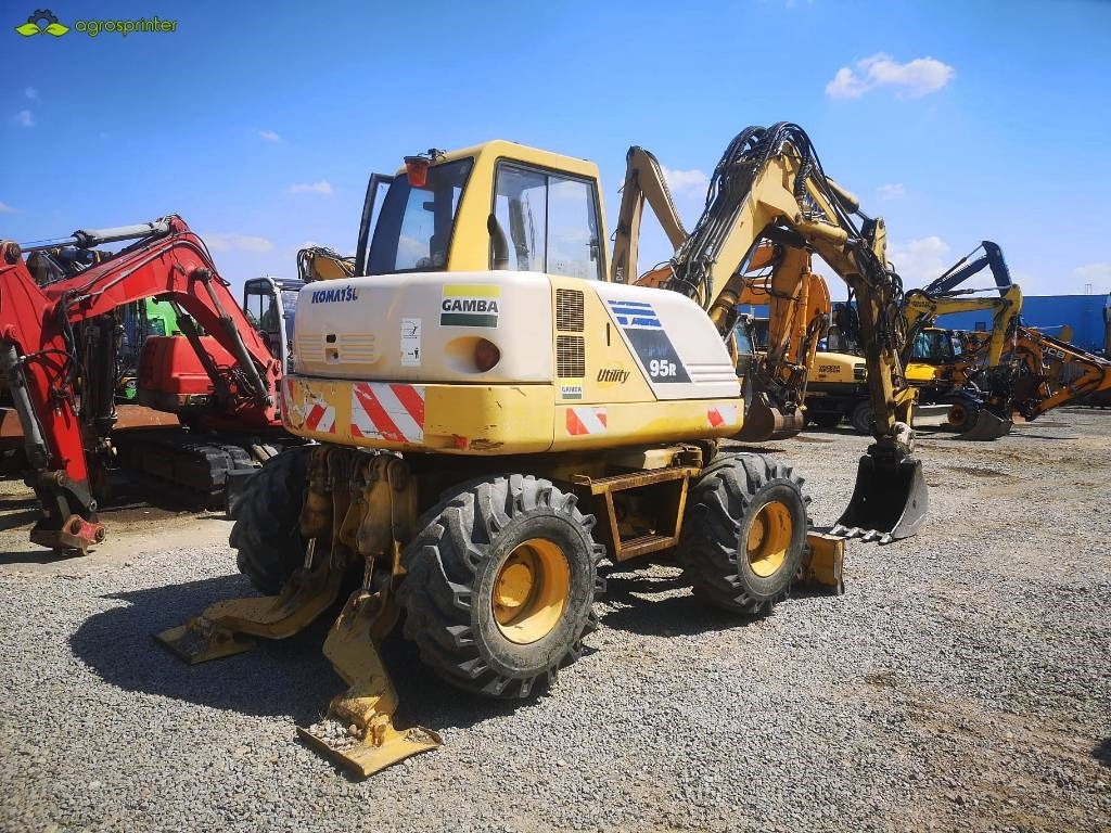 Minikotró Komatsu PW 95: 6 kép.