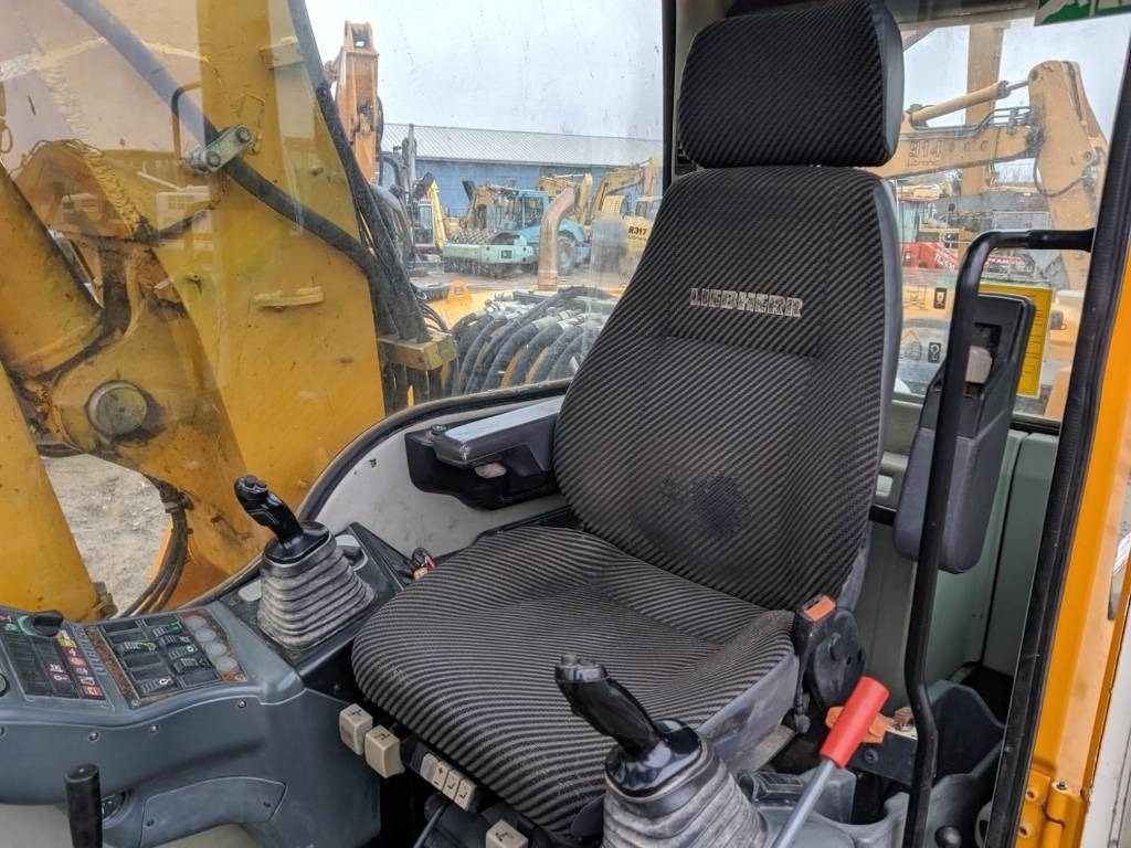 Lánctalpas kotró Liebherr R 317 Litronic: 8 kép.