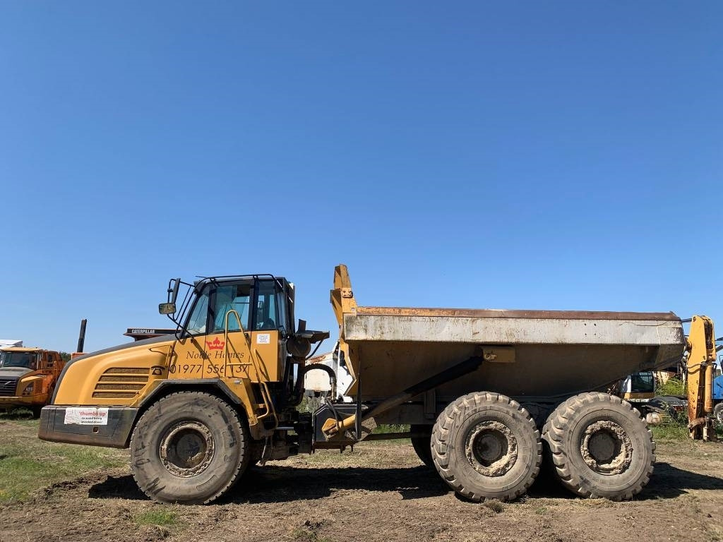 Terex TA 27 - Csuklós dömper: 2 kép. Terex TA 27 - Csuklós dömper: 2 kép.