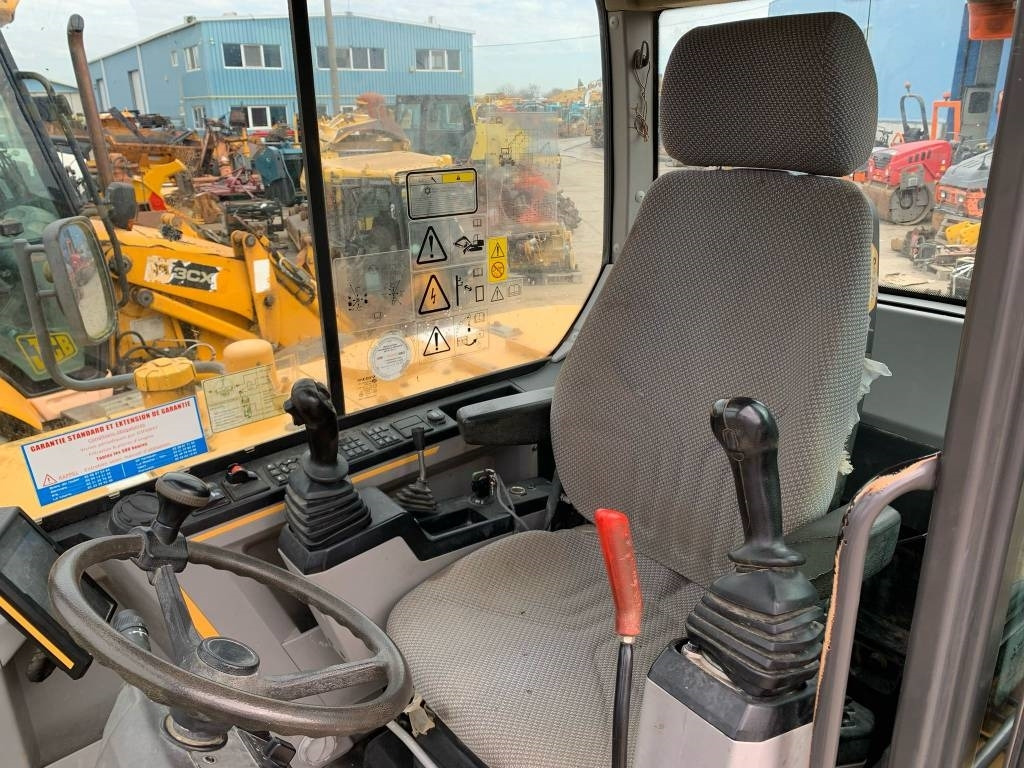 Gumikerekes kotró Volvo EW 60 E: 9 kép.