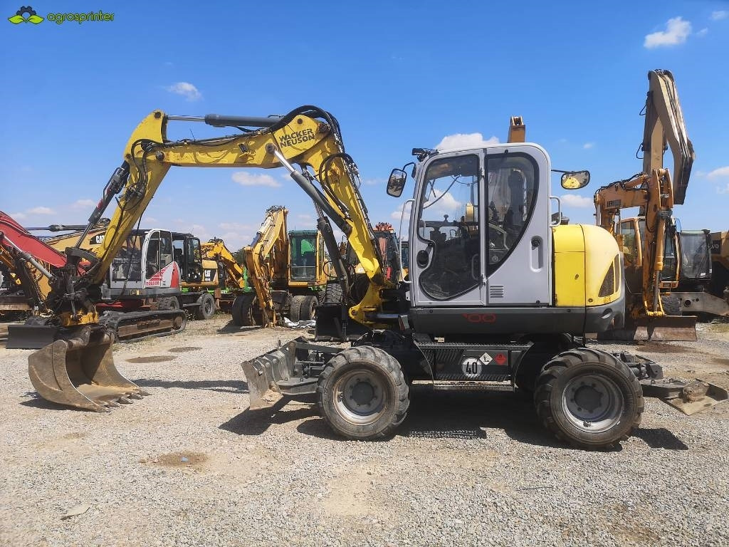 Wacker Neuson EW 100 - Gumikerekes kotró: 4 kép. Wacker Neuson EW 100 - Gumikerekes kotró: 4 kép.