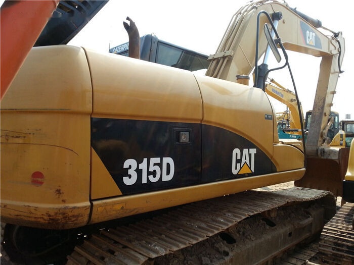 Caterpillar 315D - Lánctalpas kotró: 3 kép. Caterpillar 315D - Lánctalpas kotró: 3 kép.