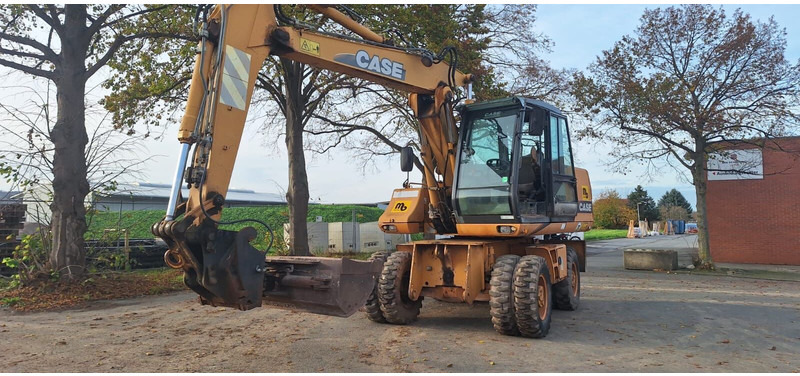 Case WX150 - Gumikerekes kotró: 2 kép. Case WX150 - Gumikerekes kotró: 2 kép.