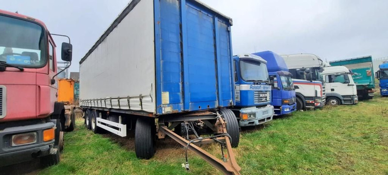 Krone ADP 27 3 Achser Anhänger - Ponyvás pótkocsi: 1 kép. Krone ADP 27 3 Achser Anhänger - Ponyvás pótkocsi: 1 kép.