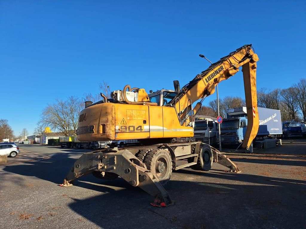Liebherr A904C Umschlagbagger Greifer +Magnetvorbereitun - Gumikerekes kotró: 2 kép. Liebherr A904C Umschlagbagger Greifer +Magnetvorbereitun - Gumikerekes kotró: 2 kép.