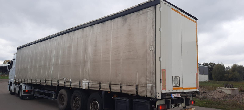 Schmitz Cargobull 3-Achser Pritsche Plane - Ponyvás félpótkocsi: 2 kép. Schmitz Cargobull 3-Achser Pritsche Plane - Ponyvás félpótkocsi: 2 kép.