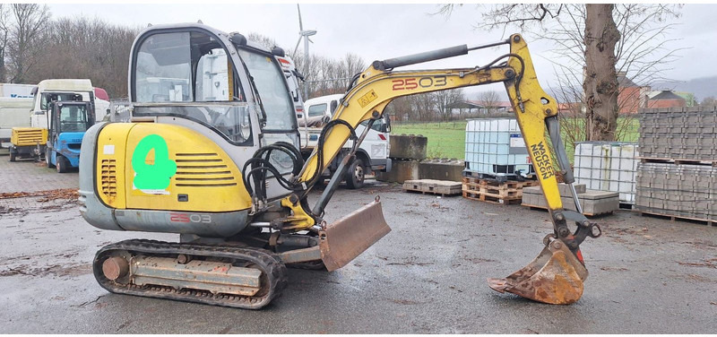 WACKER NEUSON Wacker Neuson 2503-WD Radbagger - Gumikerekes kotró: 2 kép. WACKER NEUSON Wacker Neuson 2503-WD Radbagger - Gumikerekes kotró: 2 kép.