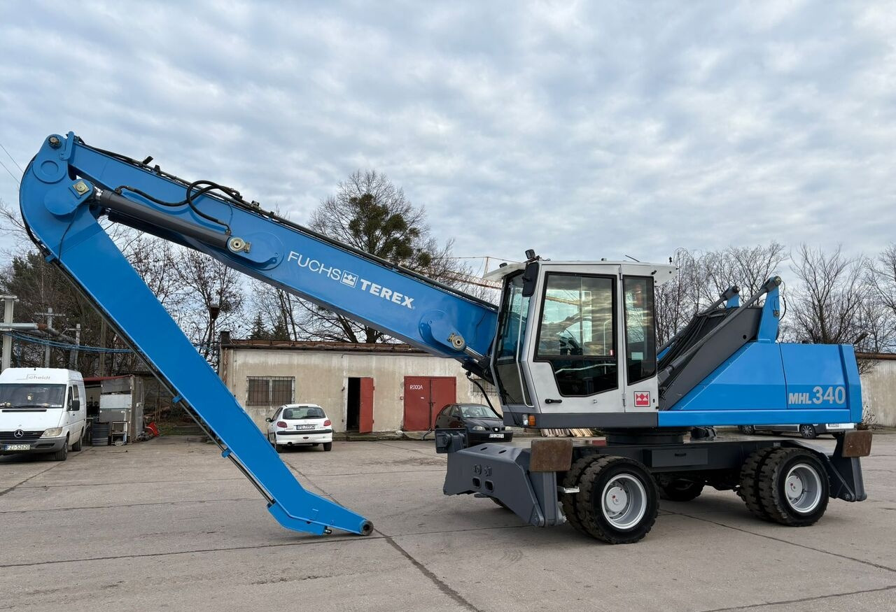 Terex-Fuchs MHL 340 C - Hulladék kotró: 1 kép. Terex-Fuchs MHL 340 C - Hulladék kotró: 1 kép.
