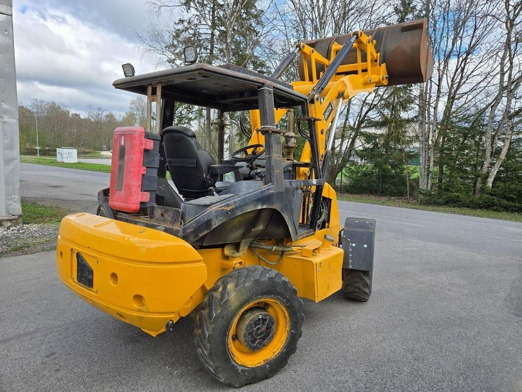 JCB 2CX  - Gumikerekes homlokrakodó: 5 kép. JCB 2CX  - Gumikerekes homlokrakodó: 5 kép.