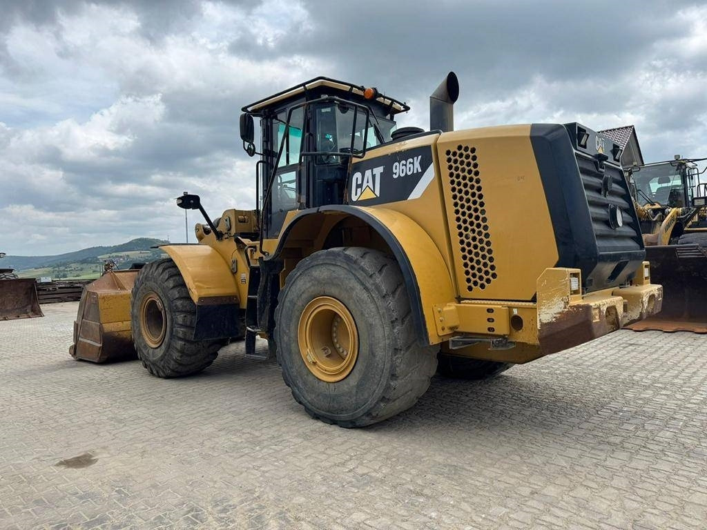 CAT 966 K - Gumikerekes homlokrakodó: 3 kép. CAT 966 K - Gumikerekes homlokrakodó: 3 kép.