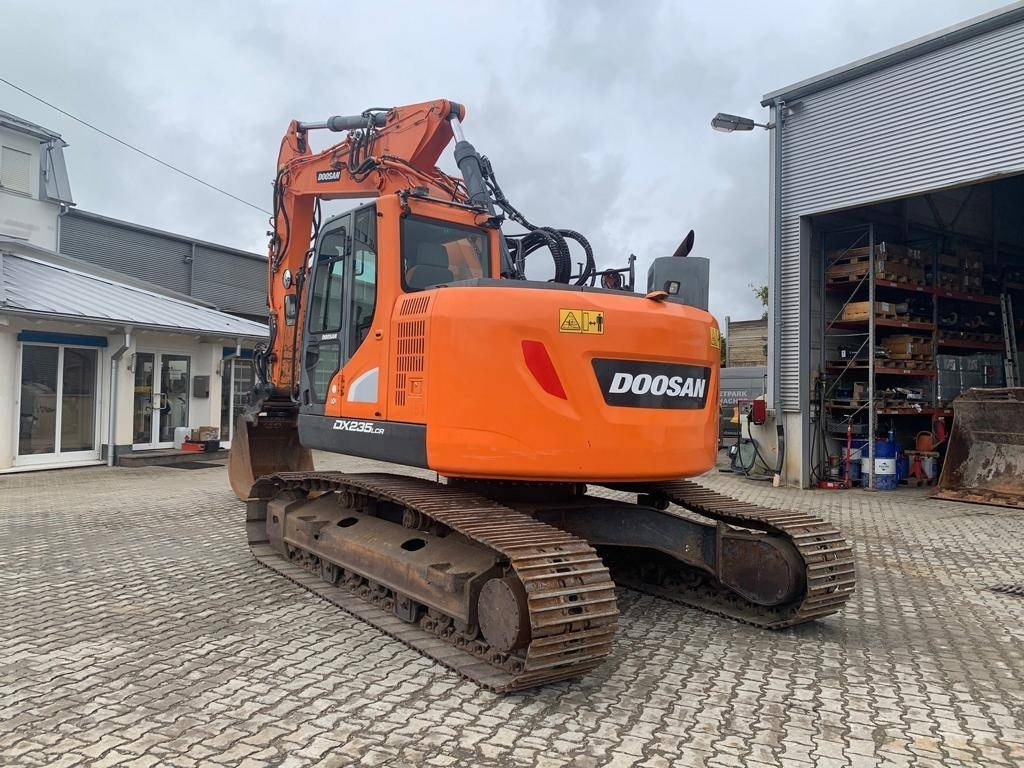 Doosan DX 235 LCR-5 - Lánctalpas kotró: 3 kép. Doosan DX 235 LCR-5 - Lánctalpas kotró: 3 kép.