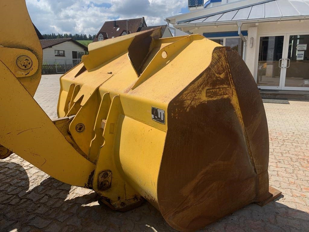 Gumikerekes homlokrakodó Komatsu WA 470-6: 9 kép.
