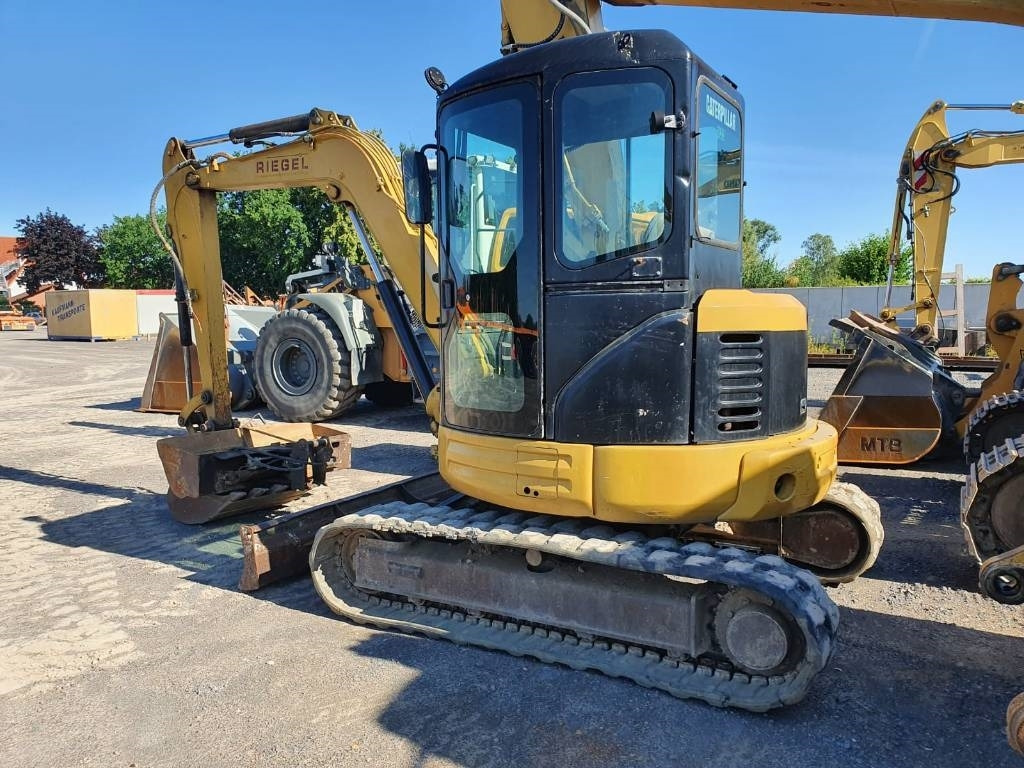 CAT 304CR - Lánctalpas kotró: 1 kép. CAT 304CR - Lánctalpas kotró: 1 kép.