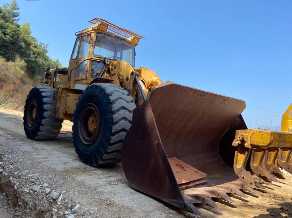 CAT 966 C - Gumikerekes homlokrakodó: 3 kép. CAT 966 C - Gumikerekes homlokrakodó: 3 kép.
